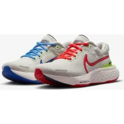 Nike ZoomX Invincible Run Flyknit 2 W - Light Bone/Red Clay/Game Royal/University Blue -Shoe Style Shop Nike ZoomX Invincible Run Flyknit 2 W Light Bone Red Clay Game Royal University Blue 1